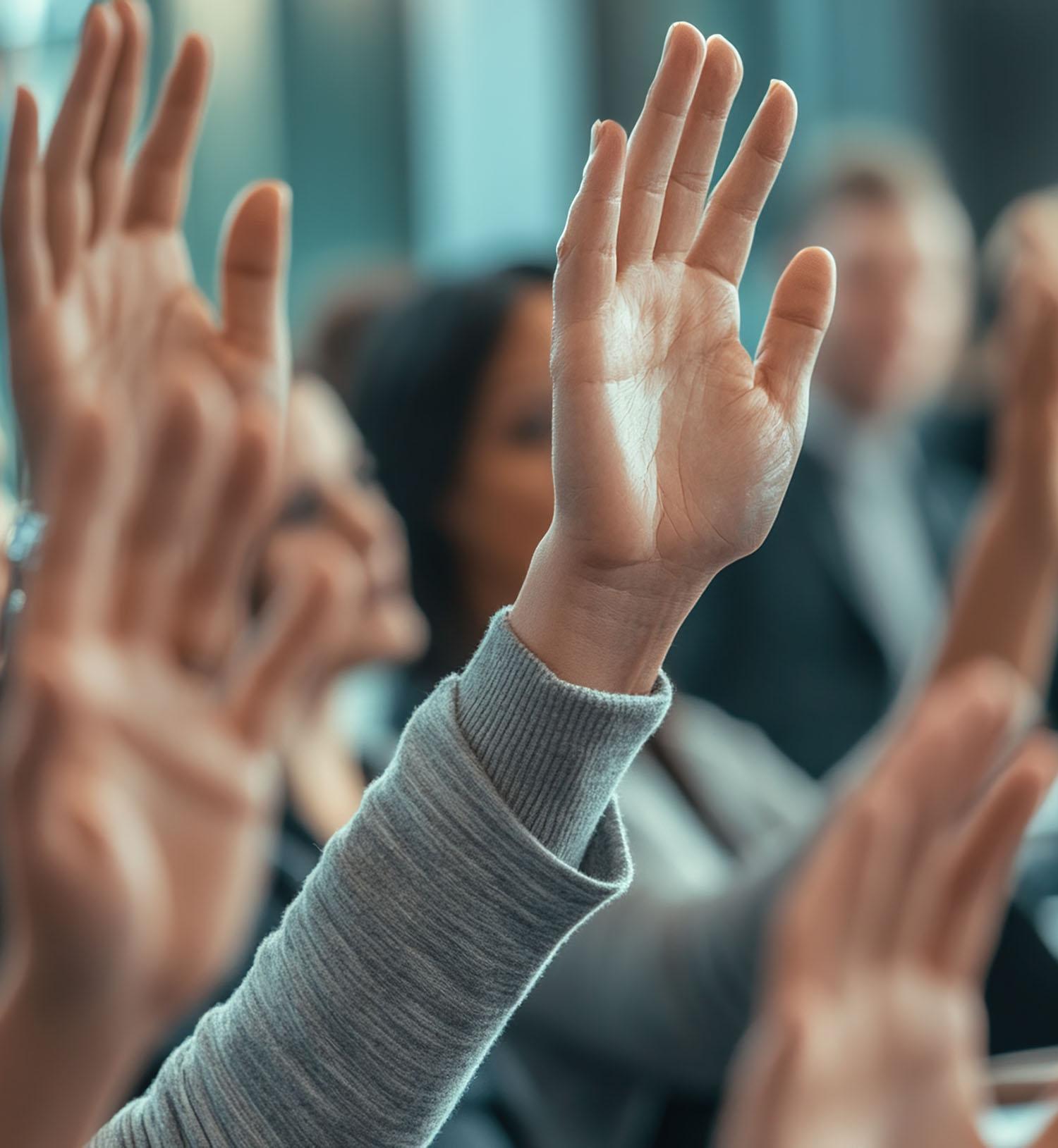 Hands raised in questions to find out if project is failing
